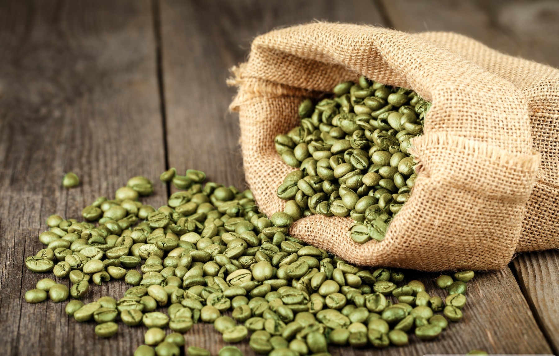 Green coffee beans in bag